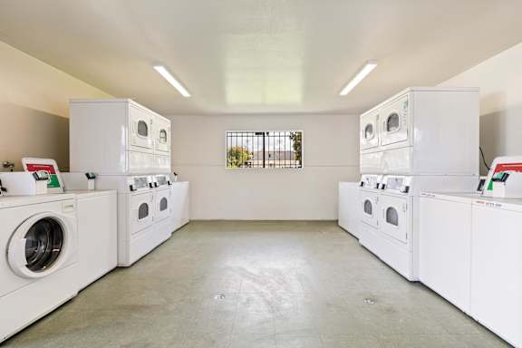 A laundromat with washers and dryers.