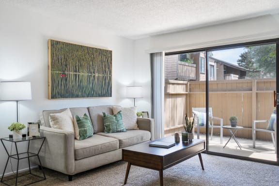 a living room with a couch and a coffee table