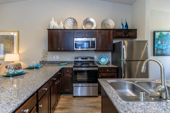 Kitchen wide view with cabinets at The Cantera by Picerne, Nevada, 89139