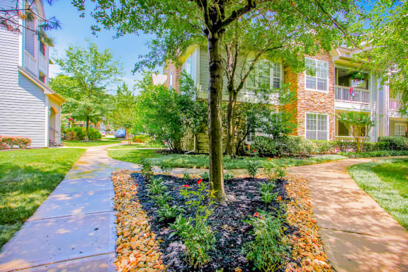 Mature trees and lush landscaping  at Remington at Memorial Apartments, Tulsa, OK