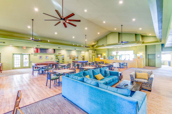 Country Club at Valley View Senior Apartments in Las Vegas offers a community clubhouse for residents to play games, read books, and play pool in!