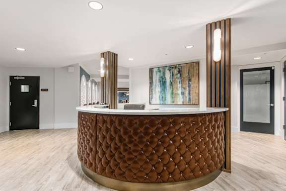 a kitchen and dining room with a table and chairs
