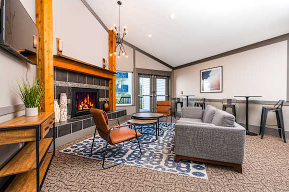 Copper Ridge Apartments in Renton, Washington Clubhouse Lounge with Fireplace
