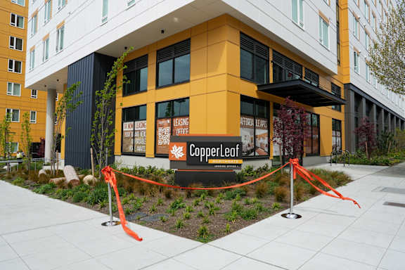 A building with a sign that says CopperLeaf in front of it.