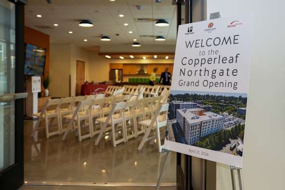 A sign welcoming people to the Copperleaf Northgate Grand Opening.
