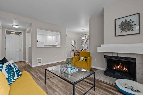 Keeler's Corner Apartments in Lynnwood, Washington Model Living Room with Fireplace