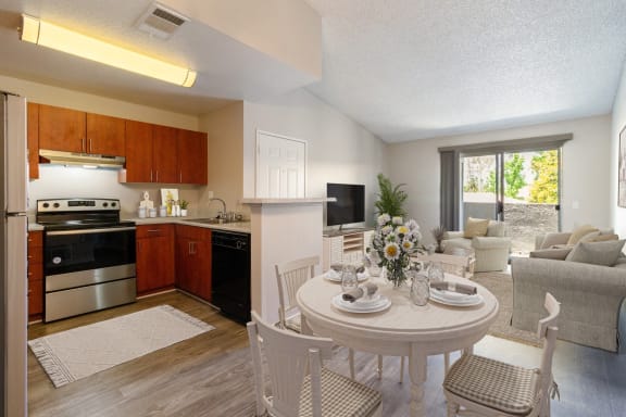 Waterstone at Murrieta Apartments in Murrieta, California Model Dining Area and Kitchen