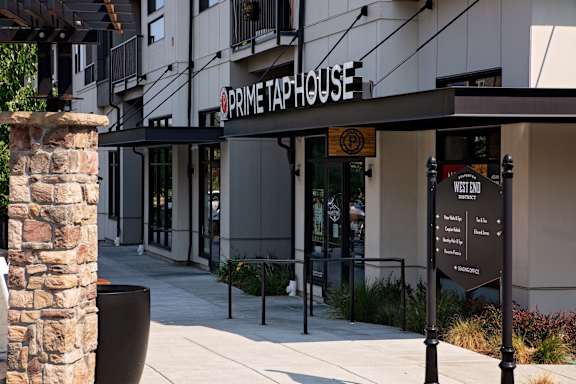 the front of a building with a sign that reads prince of the house