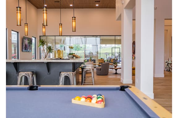 social lounge with billiards at Reveal Skyline apartments