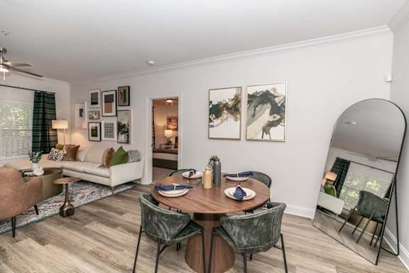 a living room with a table and a couch