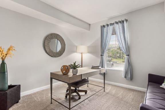 a kitchen and dining room with a table and chairs