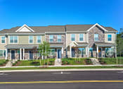 Thumbnail 2 of 5 - a large house with a street in front of it