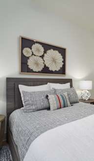 our apartments offer a bedroom with a king sized bed at Tapestry West in VA, 23230