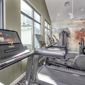 the apartments at masse corner 205 fitness room at Artistry at Winterfield Apartments, Virginia