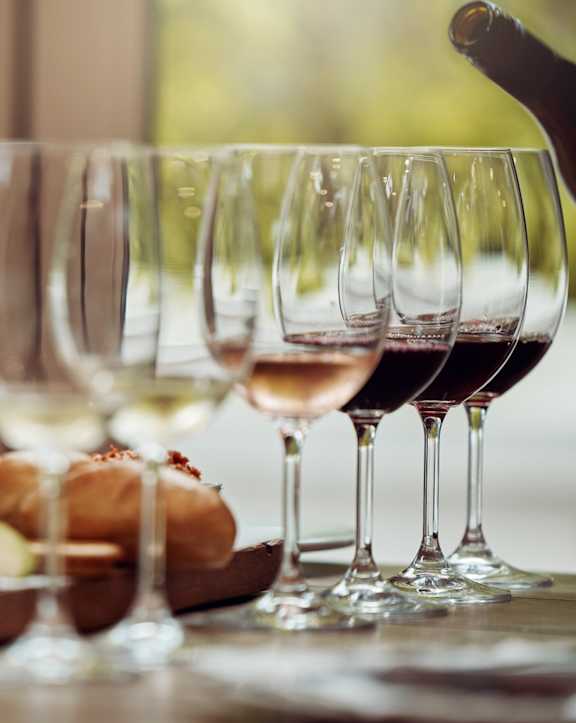 Wine Glasses on Table Next to Charcuterie