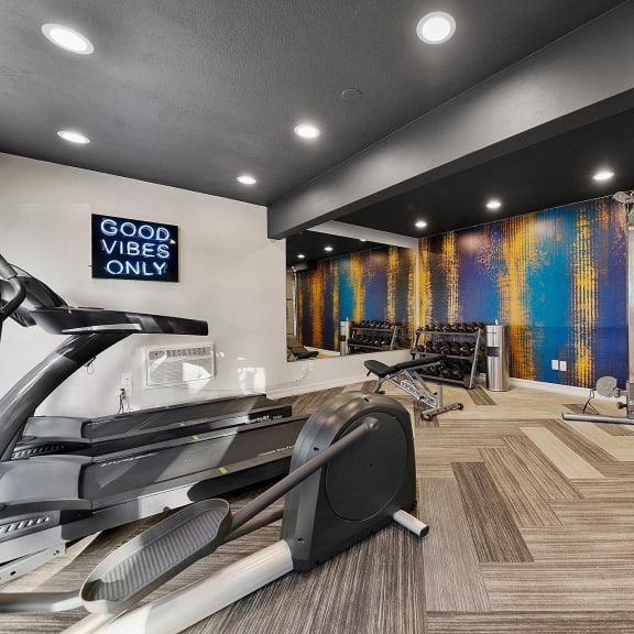 a woman walking on a treadmill with her shoes on