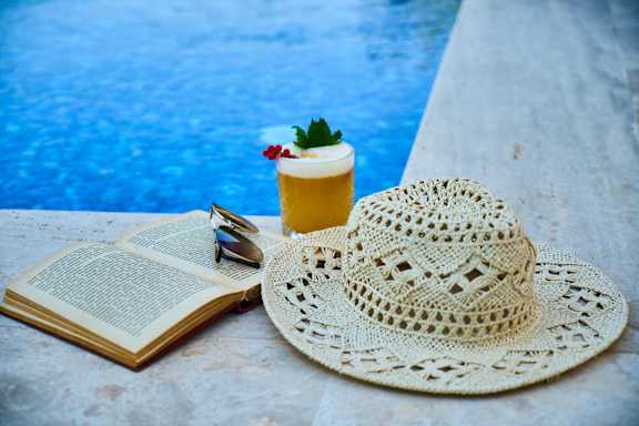 Hat , Book And A Glass Of Beer at Lakeland Town Square, Lakeland, Tennessee