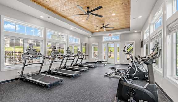 the gym with windows and exercise equipment at 1861 muleshoe drive