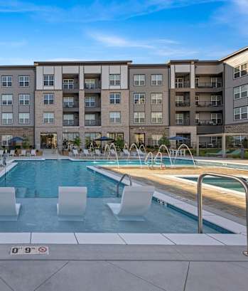 Avenue64 Luxury Apartments in O'Fallon, Missouri Pool with Lounge Chairs