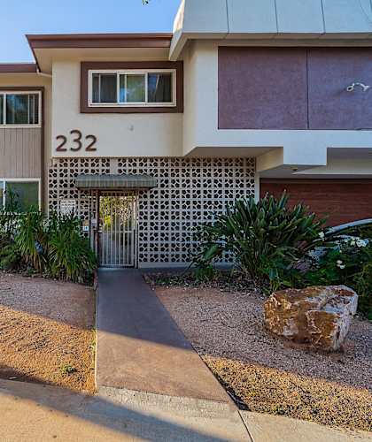 a house with a driveway in front of it