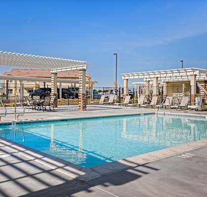 the swimming pool at the falls at rolland park apartments fl