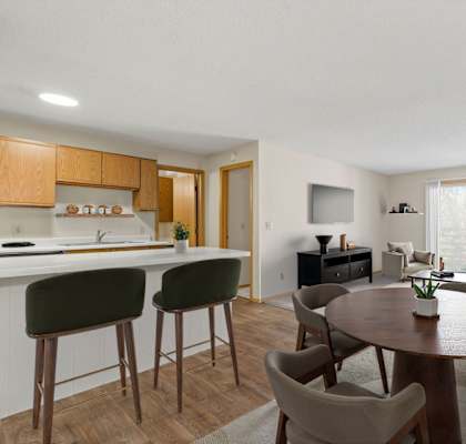 Spacious Living Area With Wood-Style Flooring