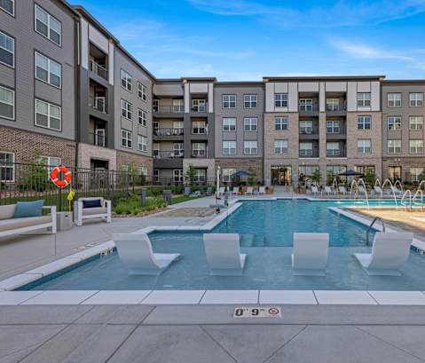 Avenue64 Luxury Apartments in O'Fallon, Missouri Pool with Lounge Chairs