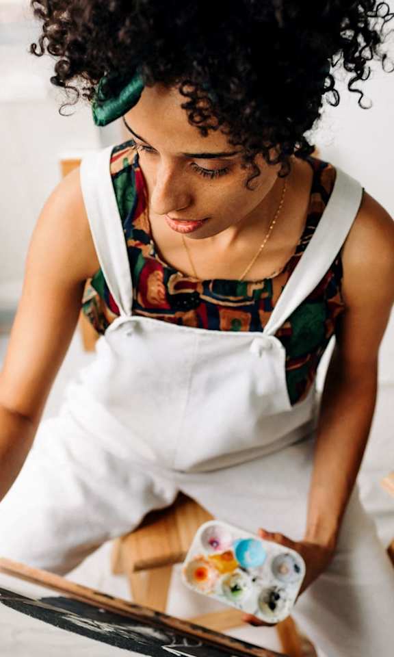 Woman Sitting on Stool Painting