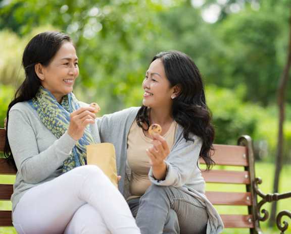 Lincoln Property Company Girls Sitting On The Park Bench