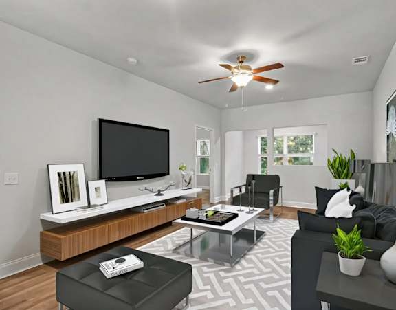 a living room with couches and chairs and a glass table at Uphill Flats, Decatur, GA, 30032