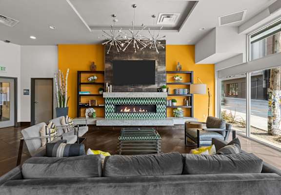 Viva Apartments in Seattle, Washington Clubhouse Lounge with Fireplace
