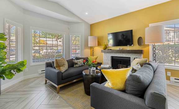 Saratoga Apartments in Everett, Washington Clubhouse Lounge with Fireplace