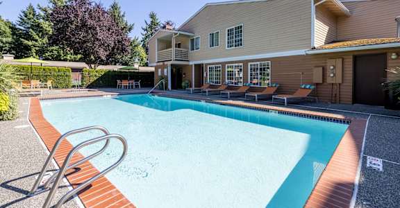 Cascadia Pointe Apartments in Everett, Washington Pool with Lounge Chairs