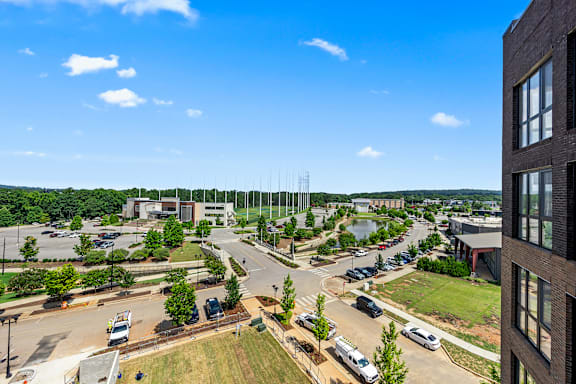 A view of a parking lot with car1 at Anthem House, Huntsville, AL, 35806
