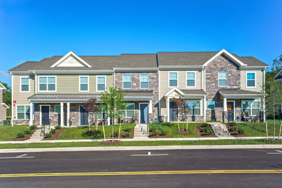 a large house with a street in front of it