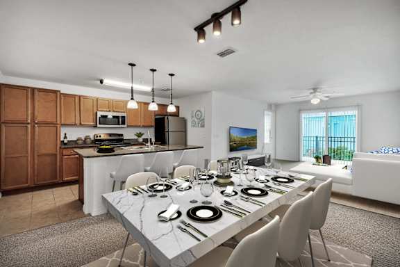 A modern dining room with a marble table and white chairs.