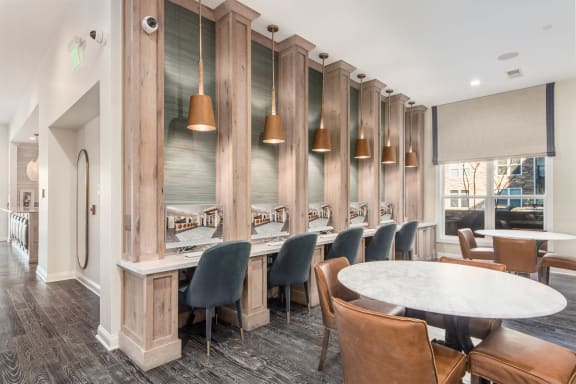 a kitchen and dining room with a table and chairs