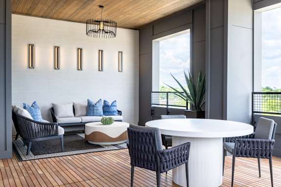 Aura Main Street Apartments in Lewisville, Texas Patio with Seating