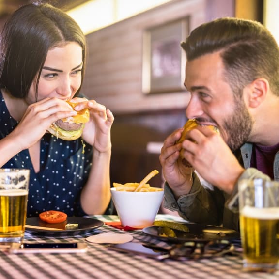 Young Couple Eating Together