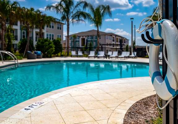 Corban Horizon West Apartments in Winter Garden, Florida Pool with Lounge Chairs