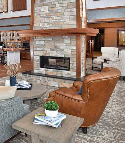 Clubroom With Fireplace at The Legends of Cottage Grove 55+ Apartments, Cottage Grove, MN 55016