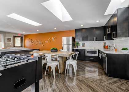 Cascadia Pointe Apartments in Everett, Washington Clubhouse Lounge with Kitchen and Games