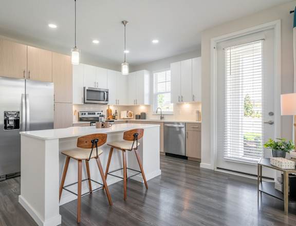 Corban Horizon West Apartments in Winter Garden, Florida Model Kitchen with Island