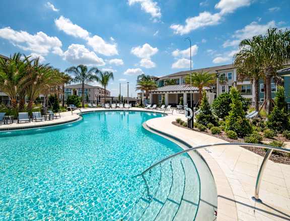 Corban Horizon West Apartments in Winter Garden, Florida Pool with Lounge Chairs