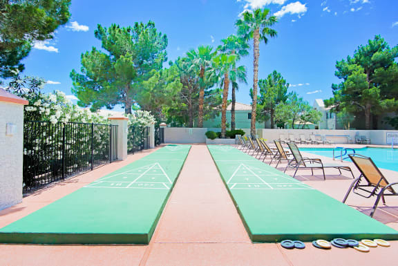 Country Club at Valley View Senior Apartments in Las Vegas offers shuffleboards for residents to enjoy out by the pool!
