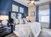 Thumbnail 16 of 44 - Bedroom With Ceiling Fan at Residence at Midland, Texas, 79706