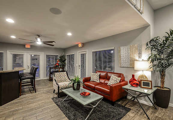 a living room with a couch and a table