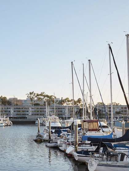 a marina filled with boats on the water