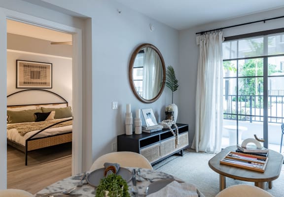 a bedroom with a bed in a room