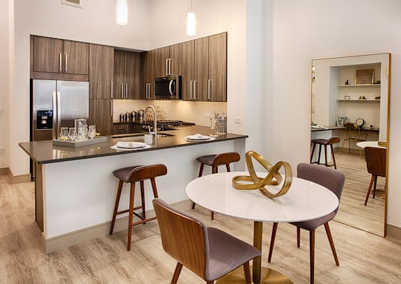 The Raleigh at Sloan's Lake Apartments in Denver, CO Kitchen and Dining Area